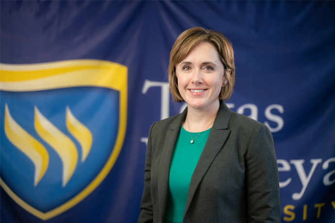 A news size staff headshot of Director of Graduate Admissions Whitney Porter
