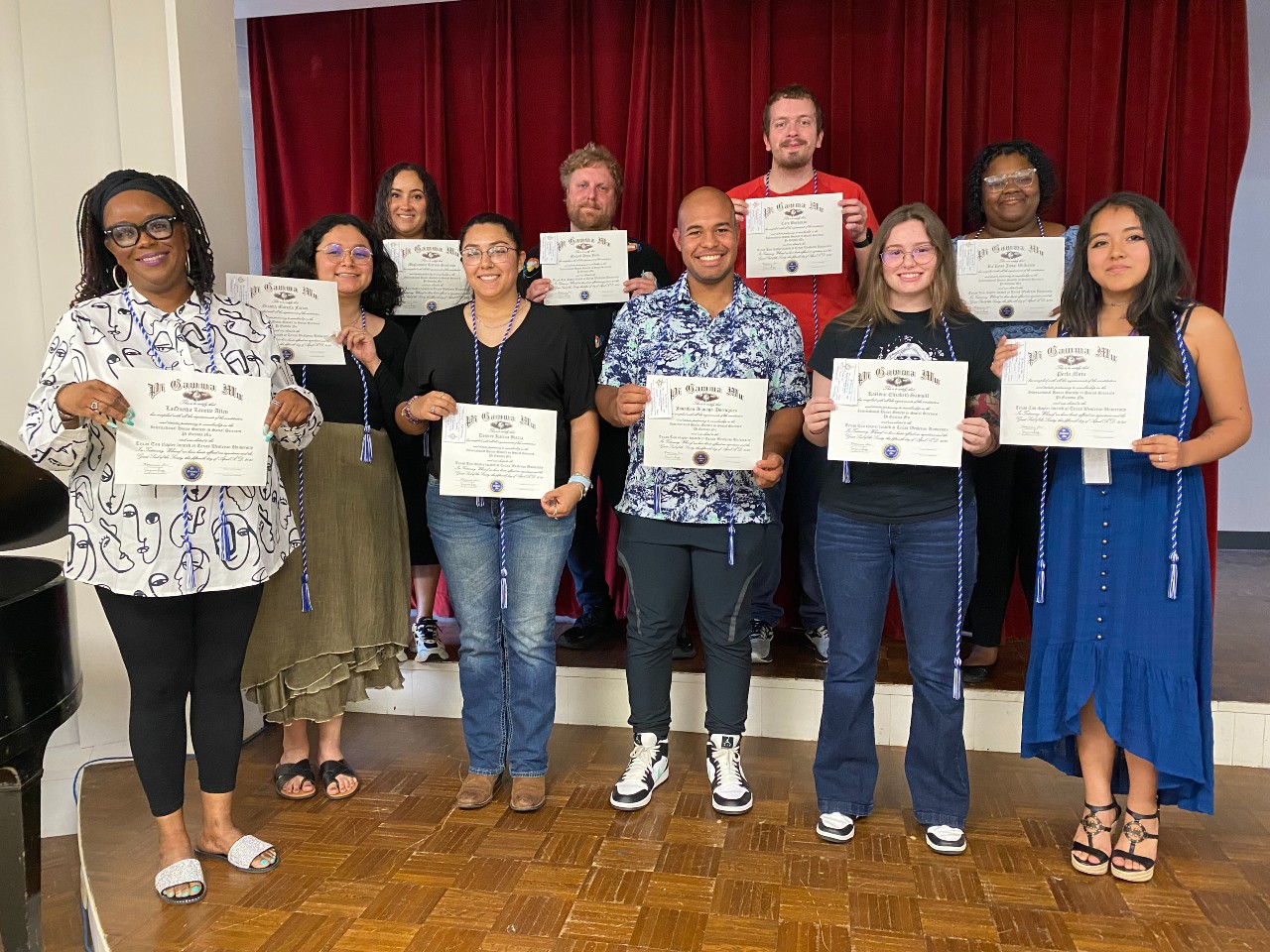 Students with certificates.