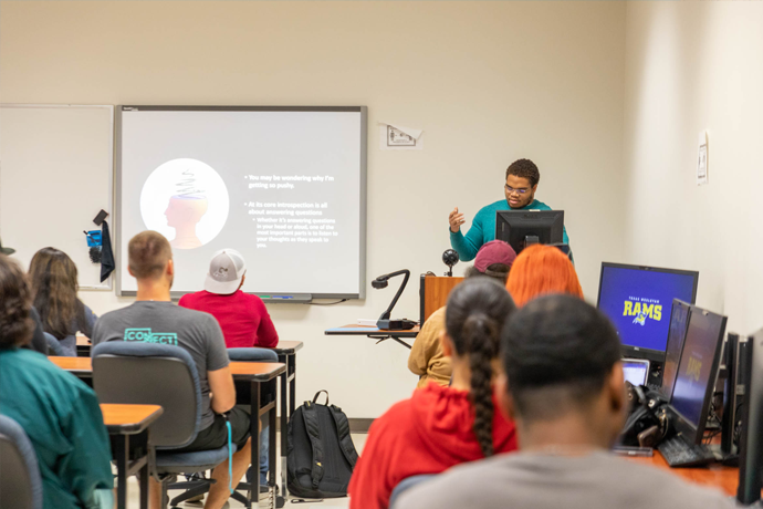 A student leading a lecture at University College Day 2023